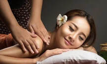 Picture of lady receiving massage at our asian massage spa. Asian Massage Muskegon MI  call 231 260-6146
